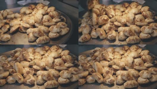 新疆传统食物——烤馒头，新疆，中国。高清在线视频素材下载