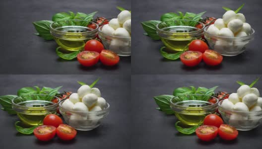 卡普里沙拉的配料:马苏里拉奶酪，西红柿，罗勒叶，橄榄油高清在线视频素材下载