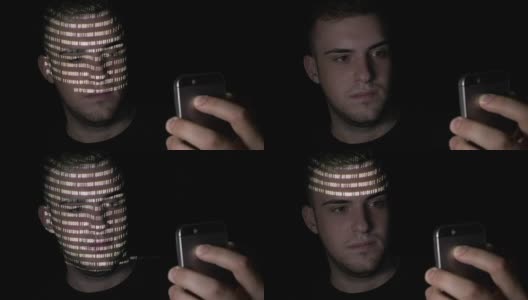 年轻男子使用智能手机的二进制代码应用程序扫描自己的脸并解锁高清在线视频素材下载