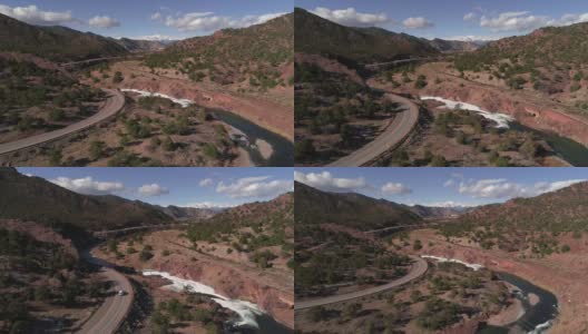 美国科罗拉多州阿肯色河沿岸高速公路的鸟瞰图高清在线视频素材下载