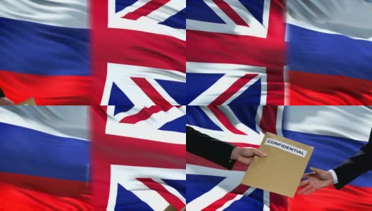 俄罗斯和英国官员交换机密信封，国旗背景高清在线视频素材下载