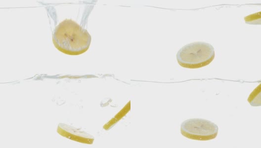 切片柠檬落入水中的慢动作视频高清在线视频素材下载