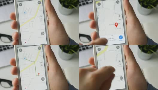 坐在办公桌前用智能手机导航或gps的男人高清在线视频素材下载