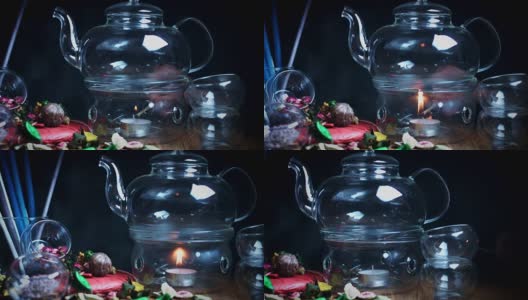 4k经典玻璃茶壶和蜡烛高清在线视频素材下载