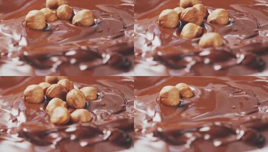 榛子落在融化的巧克力里高清在线视频素材下载