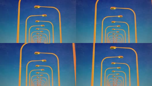摄像机在黄色的街灯柱子间盘旋。抽象的三维动画。高清在线视频素材下载