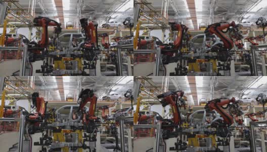 工业革命中的汽车装配厂，工作由机器人代替了人高清在线视频素材下载