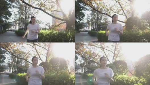 日落时分，女人在城市里奔跑高清在线视频素材下载