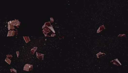 黑巧克力块在空中碰撞超级慢动作视频1000帧/秒高清在线视频素材下载