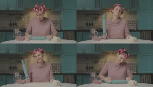 一名30多岁的年轻女子正用擀面杖擀面团，坐在厨房里看着摄像机。带卷发器在家独自做饭的家庭主妇。高清在线视频素材下载