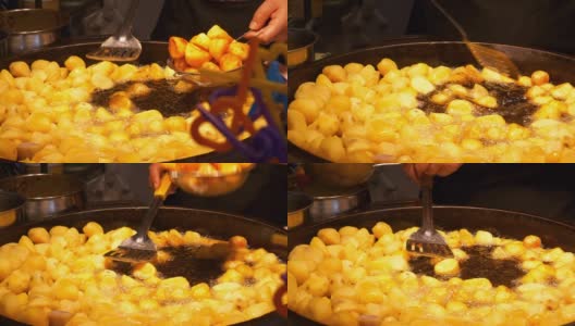 夜间时间青岛市内著名街头小吃炸土豆近景慢镜头全景4k中国高清在线视频素材下载