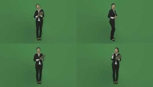 亚洲商界女性孤立绿屏绿背景快乐检查名单高清在线视频素材下载