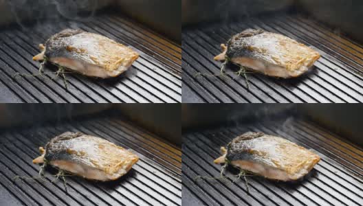 慢动作烤架上的烤红鱼牛排鲑鱼高清在线视频素材下载