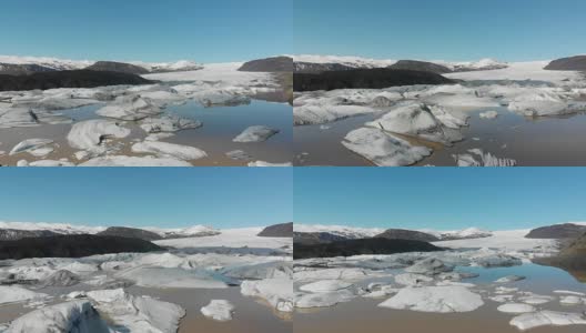 冰山和冰来自冰岛冰川的自然景观。无人机航拍Jokulsarlon冰湖冰山的镜头高清在线视频素材下载