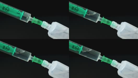塑料医用注射器，针头和塑料小瓶。医疗注射的概念。医疗设备。4 k决议。高清在线视频素材下载