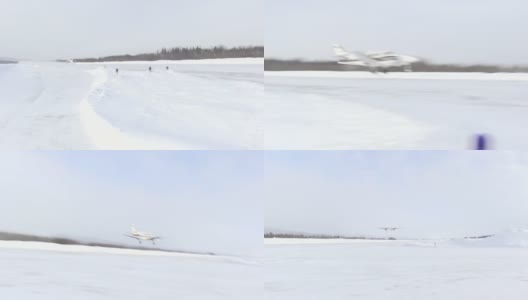 小飞机从偏僻的雪道起飞高清在线视频素材下载