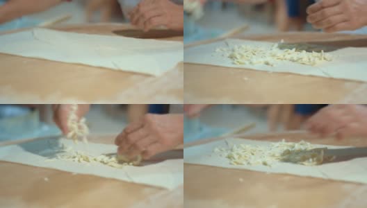 专业厨师在餐厅制作皮塔饼。烹饪美味的亚美尼亚式面包高清在线视频素材下载