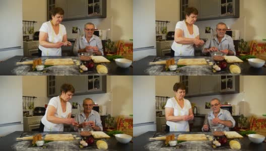 老人和妇女在包肉饺子高清在线视频素材下载