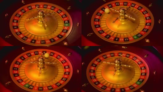 赌场轮盘赌在运动与旋转轮和球。获胜号码23和颜色红色是由轮盘赌轮决定的。低光下的轮盘赌桌布局高清在线视频素材下载
