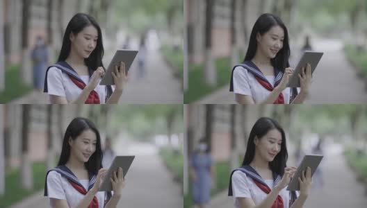 年轻的亚洲女性，使用笔记本电脑高清在线视频素材下载