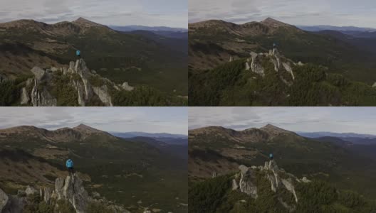 旅行者爬上山顶云梯。喀尔巴阡山脉，乌克兰，欧洲高清在线视频素材下载