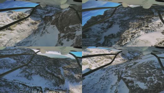 POV直升机飞过白雪覆盖的山脉高清在线视频素材下载