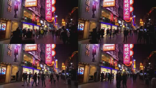 晚上，人们漫步在南京路购物街，中国上海高清在线视频素材下载
