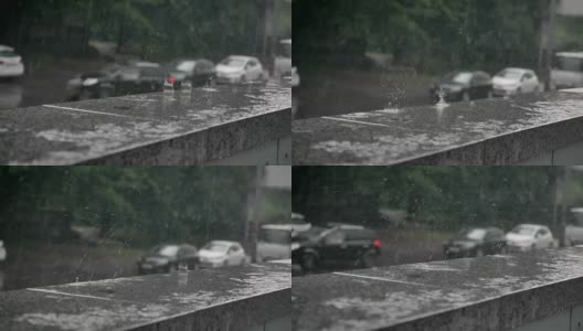 雨滴落在路边，汽车在背景，天气概念，城市概念高清在线视频素材下载