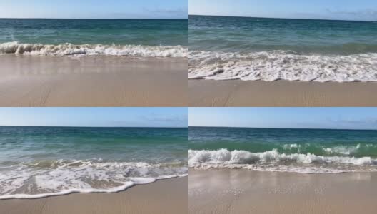 靠近的小波浪滚到海滩上高清在线视频素材下载