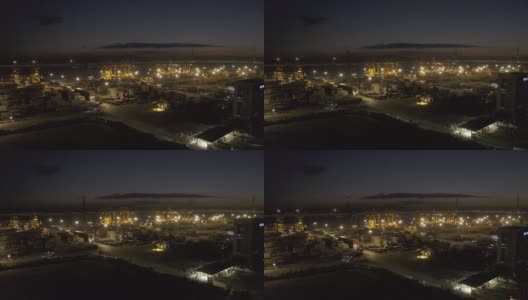 日落之后，灯火通明的大型商港码头依然繁忙高清在线视频素材下载