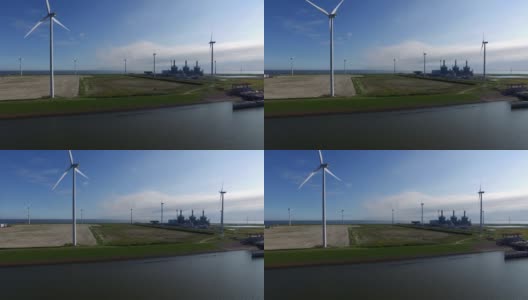 从荷兰伊姆沙芬港起航，带着海上风力发电设施高清在线视频素材下载