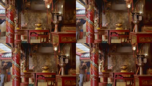 4K Man travel in china red temple背景概念为快乐春节2019显示背景，模糊户外佛教唐人街，东方宗教文化，上海城市。高清在线视频素材下载