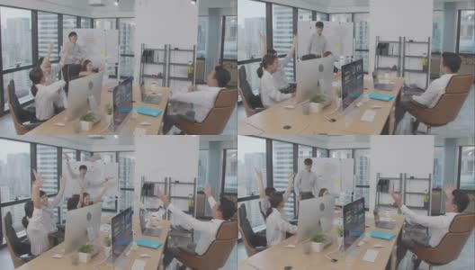 4K分辨率快乐亚洲商务团队在室内现代办公室欢笑和鼓掌庆祝，亚洲商务生活高清在线视频素材下载
