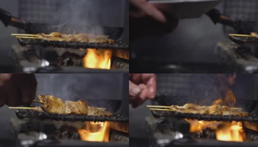小吃摊上的烤鸡肉串的慢镜头。串东京高清在线视频素材下载