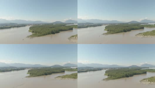 鸟瞰图的河流在山谷包围的加拿大山地景观。高清在线视频素材下载