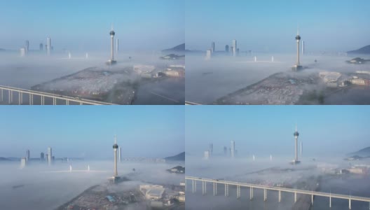 4000 -实时:清晨云海中的澳门塔和城市景观高清在线视频素材下载