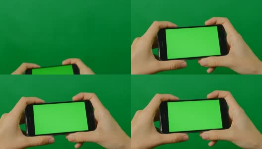 女商人用绿色背景的空白绿色屏幕手机。高清在线视频素材下载