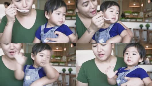 亚洲宝宝和妈妈吃饭高清在线视频素材下载