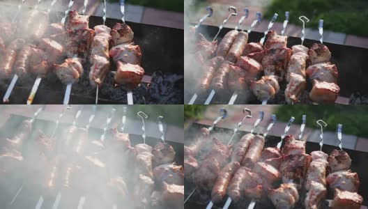烧烤美味的肉在烤架上烤。一次烧烤聚会。在明火上烤的猪肉块高清在线视频素材下载