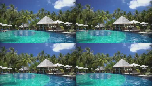 热带度假胜地的游泳池和酒吧。高清在线视频素材下载