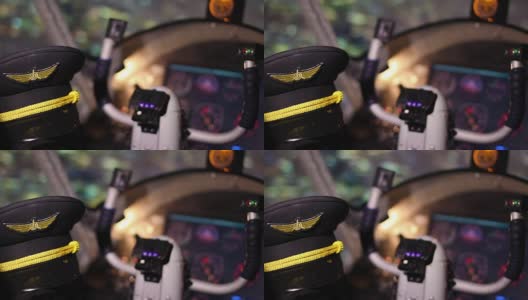 飞行员帽子在飞行训练模拟器在飞行学校，教育机会高清在线视频素材下载