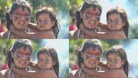 土著巴西年轻妇女和她的孩子，图皮瓜拉尼族的肖像高清在线视频素材下载