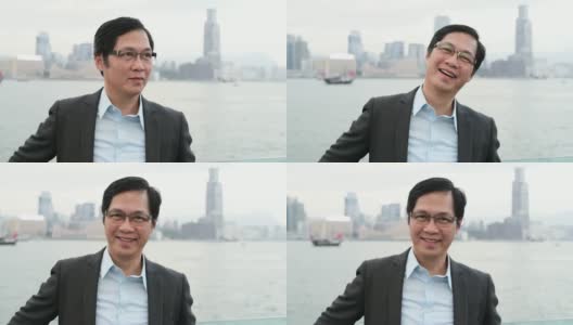聪明的中国商人微笑的肖像高清在线视频素材下载