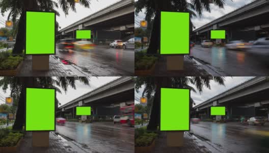 时间流逝，交通长曝光在道路与广告牌绿色屏幕用于广告的街道标志在城市。高清在线视频素材下载