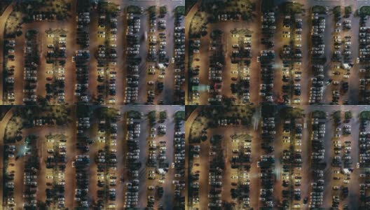 交通繁忙停车场夜间鸟瞰图高清在线视频素材下载