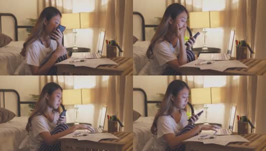 疲惫的亚洲妇女在家里工作到深夜高清在线视频素材下载