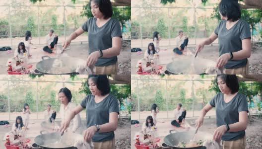 亚洲妈妈在家里做传统食物高清在线视频素材下载