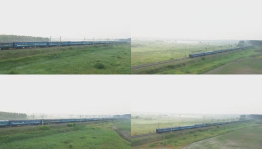 火车在黎明时乘火车穿过旷野。高清在线视频素材下载