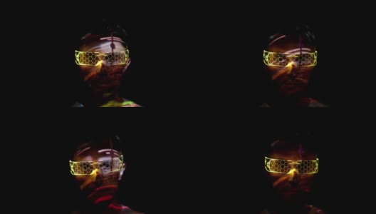 一个戴着未来眼镜的男人脸上的投影高清在线视频素材下载