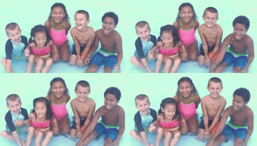 五个多民族的孩子在游泳池里大笑高清在线视频素材下载